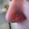 fresh nostril piercing with basic jewelry