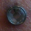 fresh dermal anchor on the side of the neck with bezel set cz (zoomed in view)