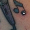 three very healed 18g dermal anchors on the nape, two fresh 18g dermal anchors on the nape