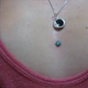 Fresh dermal anchor on the chest with flower gem