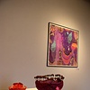 Jeanine's felted bowls are in the foreground with Krista's framed digital print behind on the wall.