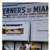 in front of family factory in Miami, Fl