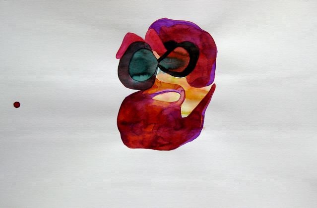 Man with big sunglasses and beard walking by