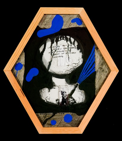 Shaped black and blue drawing in a wood frame
