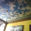 Trompe l'oeil ceiling and custom finish walls.