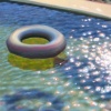 Salt Water Pool with Inner Tube in Sun