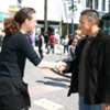 Strangers Shaking Hands