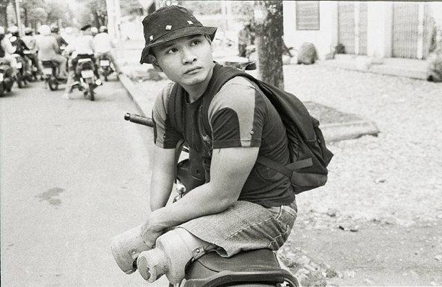 Loi on his custom Motobike.