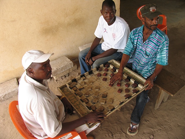 Men playing "Drafts", Freetown, Sierra Leone