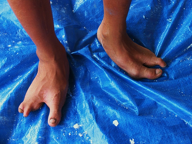 Lo's feet.  He is training in Masonry at a facility outside of Ho Chi Minh city.