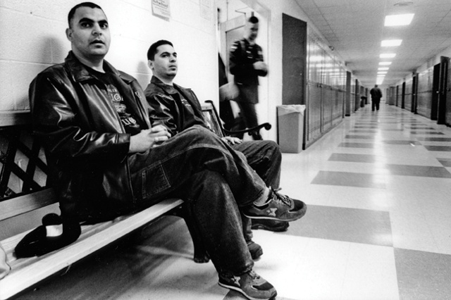 Shark and Steve wait in the hallway at Belfast High School, to speak at a conference on "Muslim Unity".