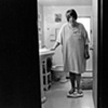 Maggie weighs herself.  Just one week after surgery she has lost more then fifteen pounds.