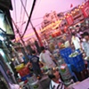 Dinner at a street kiosk, District 10, Ho Chi Minh City.
