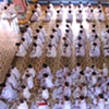 The Cao Dai, a religious sect based in Thay Ninh province, during a daily ceremony.