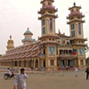 The outside of the Cao Dai Temple.  Founded in 1926, the Cao Dai is a mix of Buddhism, Catholocism, Taoism, Confucianism and Hindu.  Thier saints include Napolean Bonaparte and Victor Hugo.