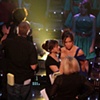 Singer and Presenter Myleene Klass receiving instructions from a BBC producer