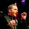 Only Men Aloud's choir master Tim Rhys-Evans giving winning directions