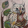 Striped Owl in a Tree