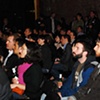 The Audience Listening Intently 