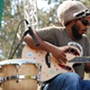 A Serious Ziggy Marley with Colorful Butterfly Stickers
