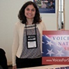 A Vendor Seeks Out Volunteers for National Service.