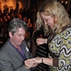 Dale Places the Ring on Laura's Ring Finger.