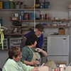 Students working on raku pieces