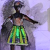 Marionette in a striped dress 