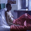 Untitled (a model under a red blanket)