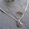 Tiny 'button' pendant