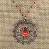 Filigree Medallion with Coral