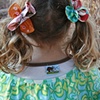 Hand sewn flowers adorn simple elastic hair ties.
