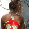 Back view of cherry red sundress.  Drawstring slides through the T back for comfort and ease of movement.