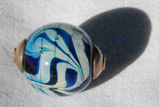 Capped kronos silver bearing bead