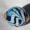 Capped kronos silver bearing bead
