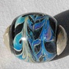 Capped silver bearing bead