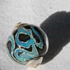 Capped crazy silver bearing bead