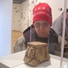 Michelle Miller looking at a sculpture at Hallwalls.