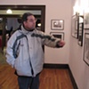 John looking at photographs at Karpeles Manuscript Library Museum in Buffalo.