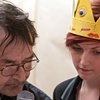 John Harold Gordon reading one of his poems with the support of book editor Katherine A. Loewen.