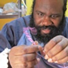 Paul Chandler  working on his artwork
