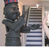 Mimi greeting a Bill Stewart Sculpture at Indigo Gallery.