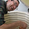 John Price assisting staff with unloading the kiln after a ceramic bisque firing.