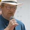 John Budney reading his poetry at the "Starlight's Genesis" poetry book launch on June 3.