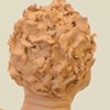 The Emerging Artist-closup Top Figure back