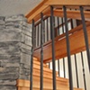 Timber Stairs, forged spindles, stone work. Detail