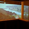 Reclamation Bunker v1, view from interior looking out onto video.