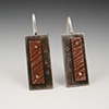 Mixed metal earrings with rivets