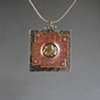 Copper and Silver with Trapped Reticulated Brass Pendant