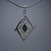 reticulated silver and greenstone pendant